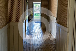 Epty Hotel Hallway with Wooden Board Floor