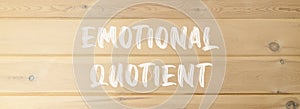 EQ emotional quotient symbol. Concept words EQ emotional quotient on beautiful wooden wall. Beautiful wooden wall background. photo