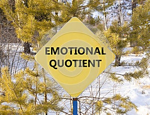 EQ emotional quotient symbol. Concept words EQ emotional quotient on beautiful yellow road sign. Beautiful forest snow sky photo