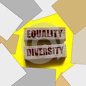 Equality diversity words written on wood blocks. ETolerance inclusion social and business concept photo