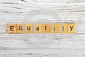 EQUALITY word made with wooden blocks concept