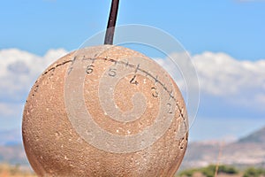 Equatorial sundial dial, marking the hours photo