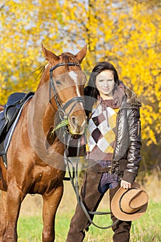 Equestrian with her horse