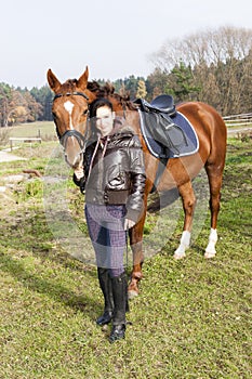 Equestrian with her horse