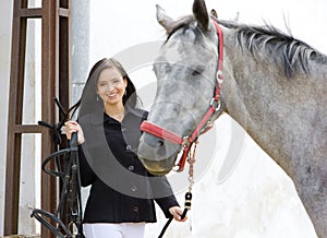 Equestrian with horse