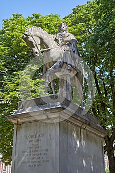 Equestrian statue of Louis XIII by Jean-Pierre Cortot 1787-1843 in a sunny summer day in Paris