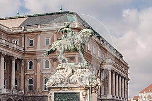 Equestrian statue of Prince Savoyai Eugen in front of the historic Royal Palace in Buda Castle