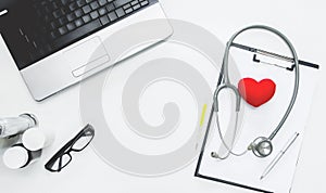 equiment Medical instruments,technology  laptop,stethoscope and glasses on white table