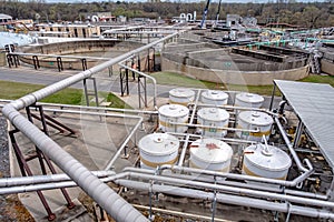 Equipment, cables and piping as found inside of industrial plant