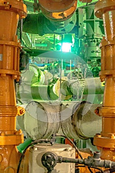 Equipment, cables and piping as found inside of industrial power plant