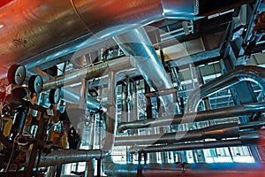 Equipment, cables and piping as found inside of a modern industrial power plant