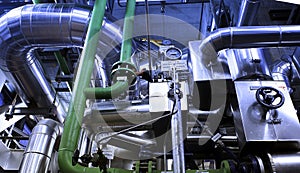 Equipment, cables piping as found inside of a modern industrial power plant