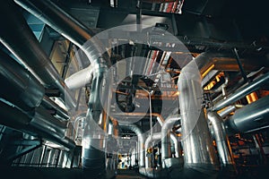 Equipment, cables and piping inside of a modern industr