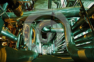 Equipment, cables and piping inside of a modern industr