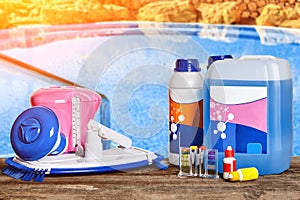 Equipment with chemical cleaning products and tools for the maintenance of the swimming pool.