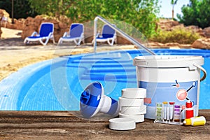 Equipment with chemical cleaning products and tools for the maintenance of the swimming pool.