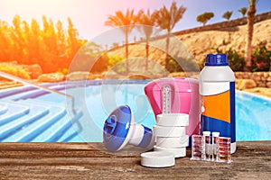 Equipment with chemical cleaning products and tools for the maintenance of the swimming pool.