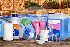 Equipment with chemical cleaning products and tools for the maintenance of the swimming pool.