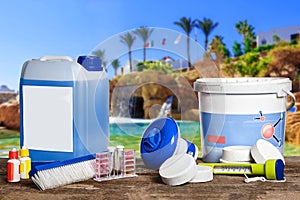 Equipment with chemical cleaning products and tools for the maintenance of the swimming pool.