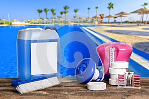 Equipment with chemical cleaning products and tools for the maintenance of the swimming pool.