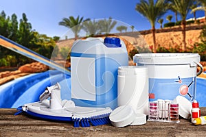 Equipment with chemical cleaning products and tools for the maintenance of the swimming pool.