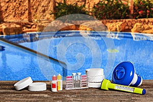 Equipment with chemical cleaning products and tools for the maintenance of the swimming pool.