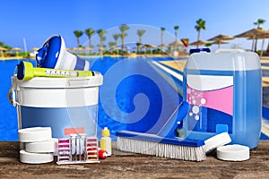 Equipment with chemical cleaning products and tools for the maintenance of the swimming pool.