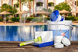 Equipment with chemical cleaning products and tools for the maintenance of the swimming pool.