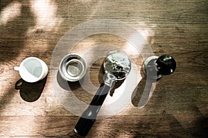 Equipment of classic Coffeemaker arranged on wooden surface