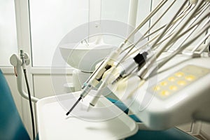 Equipment and dental instruments in dentist`s office. Tools close-up. Dentistry