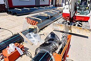 Equipment and device for butt welding polymeric HDPE water pipes