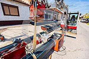 Equipment and device for butt welding polymeric HDPE water pipes