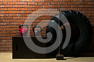 Equipment for endurance sports and fitness training on the background of a red brick wall