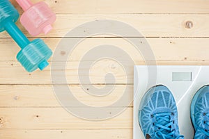 equipment exercise on top wooden floor background / top view pic