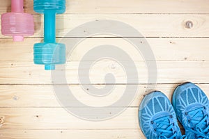 equipment exercise on top wooden floor background / top view pic