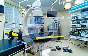 Equipment and medical devices in modern operating room. Interior. Operating theatre. Selective focus.