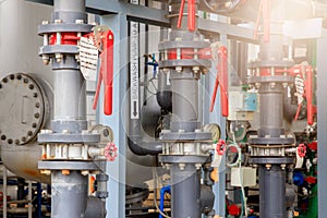 The equipment of oil refining, Detail of oil pipeline with valves in large oil refinery, Industrial zone.