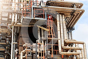 The equipment of oil refining, Detail of oil pipeline with valves in large oil refinery, Industrial zone.