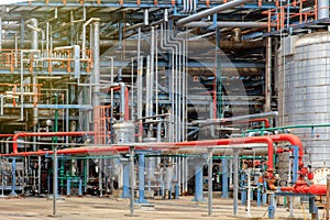 The equipment of oil refining, Detail of oil pipeline with valves in large oil refinery, Industrial zone.