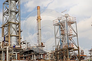The equipment of oil refining, Detail of oil pipeline with valves in large oil refinery, Industrial zone.
