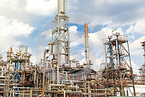 The equipment of oil refining, Detail of oil pipeline with valves in large oil refinery, Industrial zone.