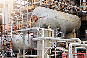 The equipment of oil refining, Detail of oil pipeline with valves in large oil refinery, Industrial zone. photo