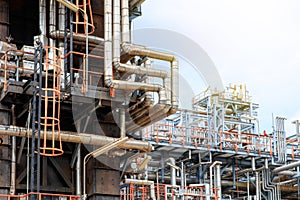 The equipment of oil refining, Detail of oil pipeline with valves in large oil refinery, Industrial zone.