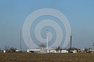 Equipment for oil separation. The station is in the field.