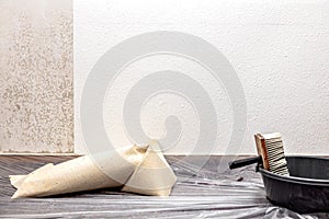 Equipment of a painter for soaking and removing wallpaper photo