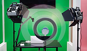 Equipment for personal broadcasting with green background and lights