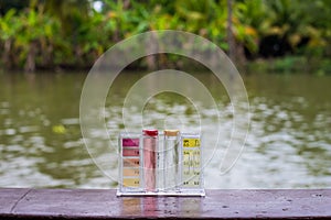 PH Test Kit on swim pool river water inspector