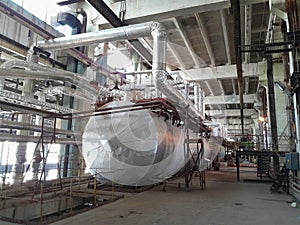 Equipment, piping and electrical machines inside of modern industrial power plant