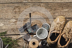 Equipment set for traveler including hiking boots and walki-talkie