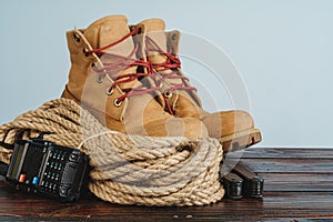 Equipment set for traveler including hiking boots and walki-talkie